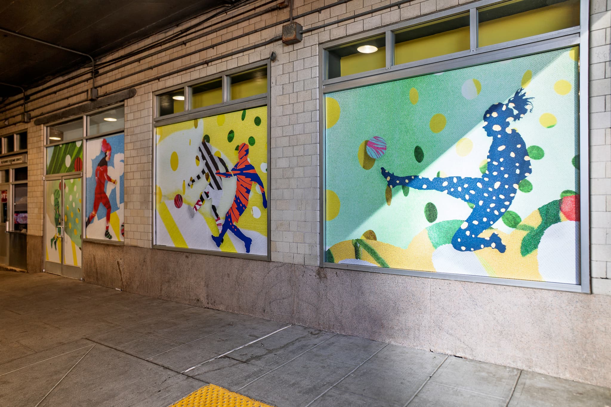 A Field of Many Threads by Eirini Linardaki placed on retail windows for NJ Transit