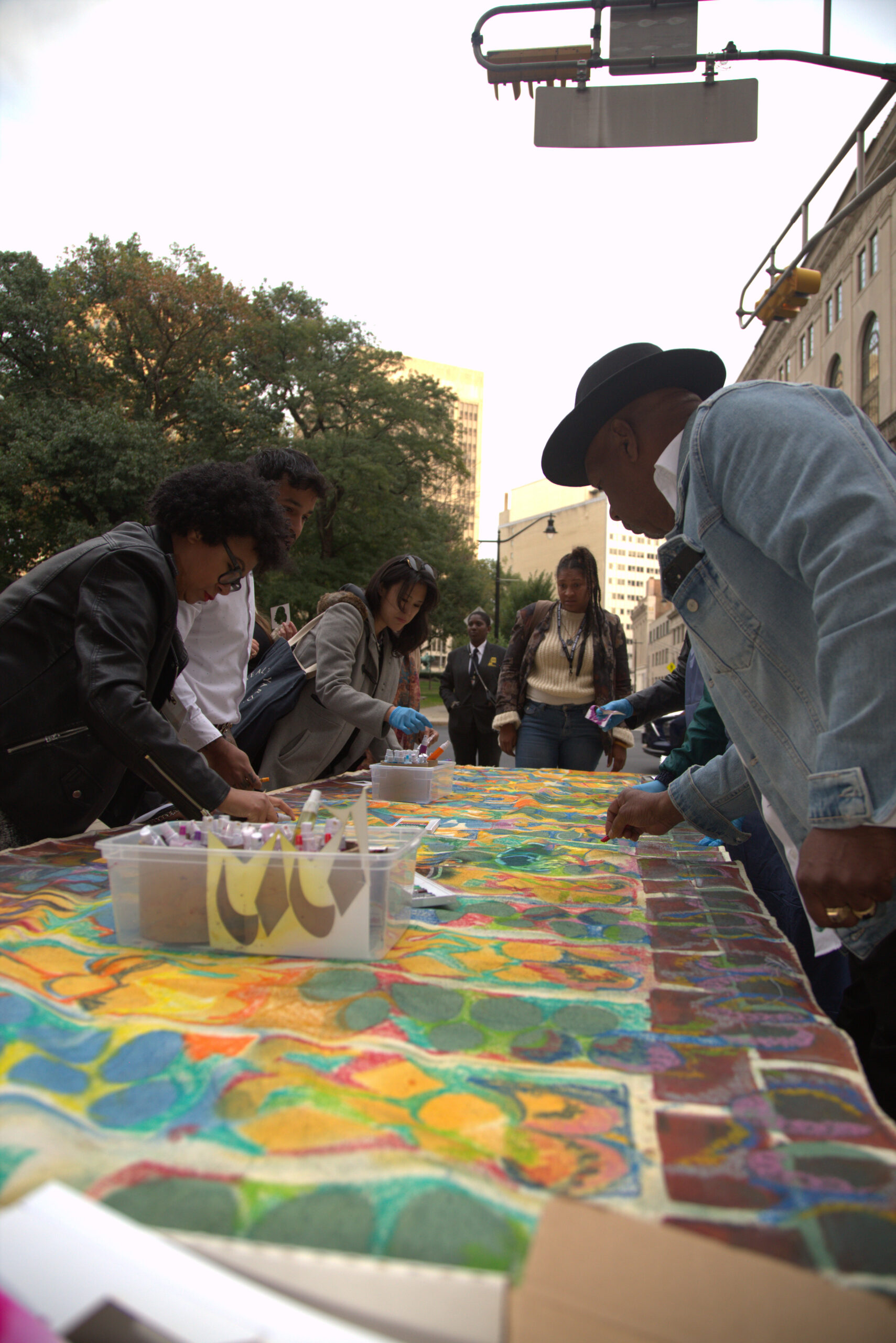 Community art making during Newark Arts Festival 2023 at the main entrance of The Newark Museum Of Art, photo by Barry Crentsil.